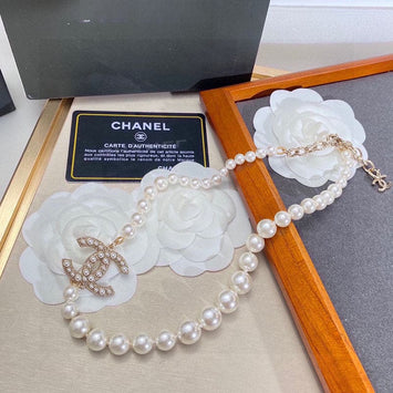 Chanel 100th Anniversary Faux Pearl & Strass CC Pendant Necklace -  Gold-Plated Pendant Necklace, Necklaces - CHA937677 | The RealReal